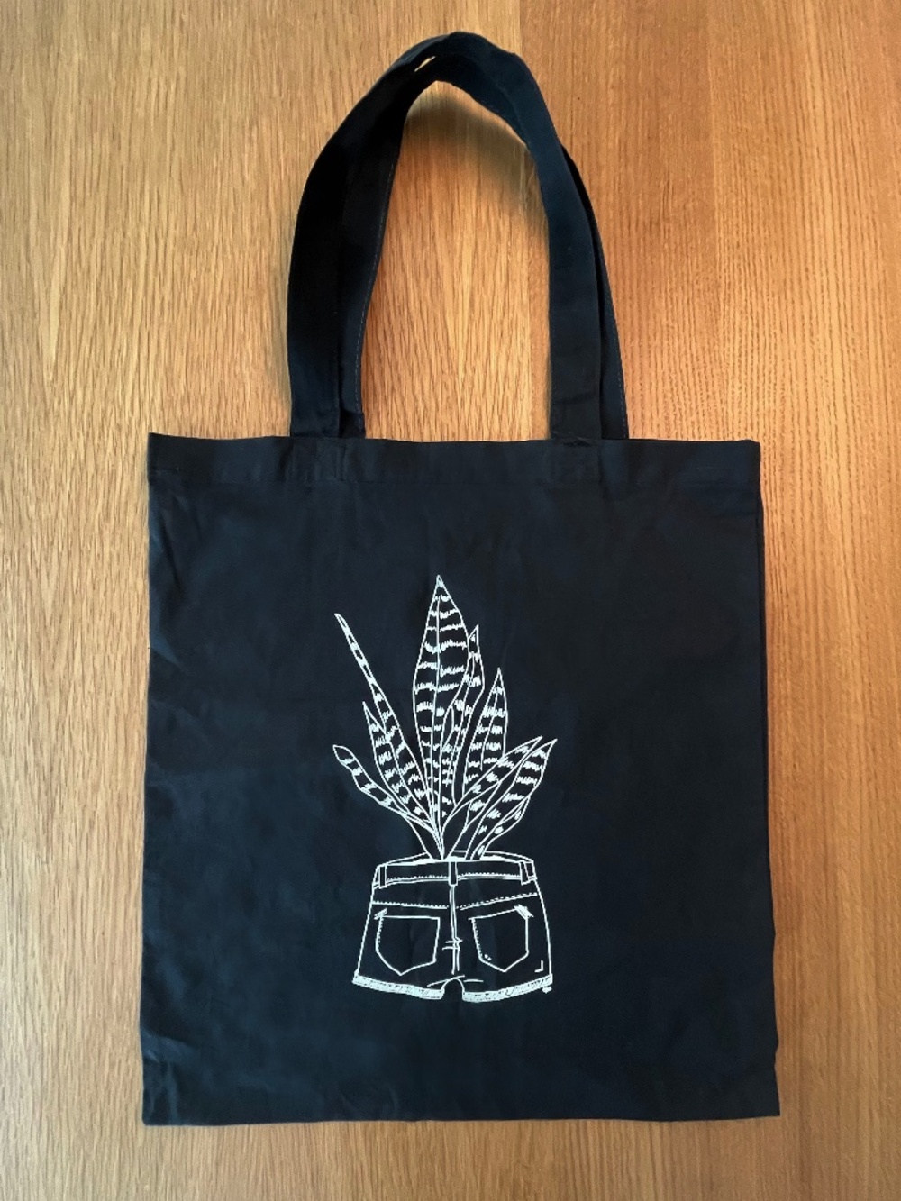 P(L)ANT Minimalist White Line Art Black Canvas Tote.
